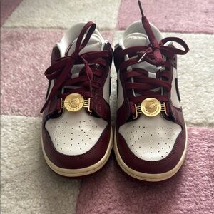 Nike Women’s Dunk Low SE “sisterhood team red” sneakers